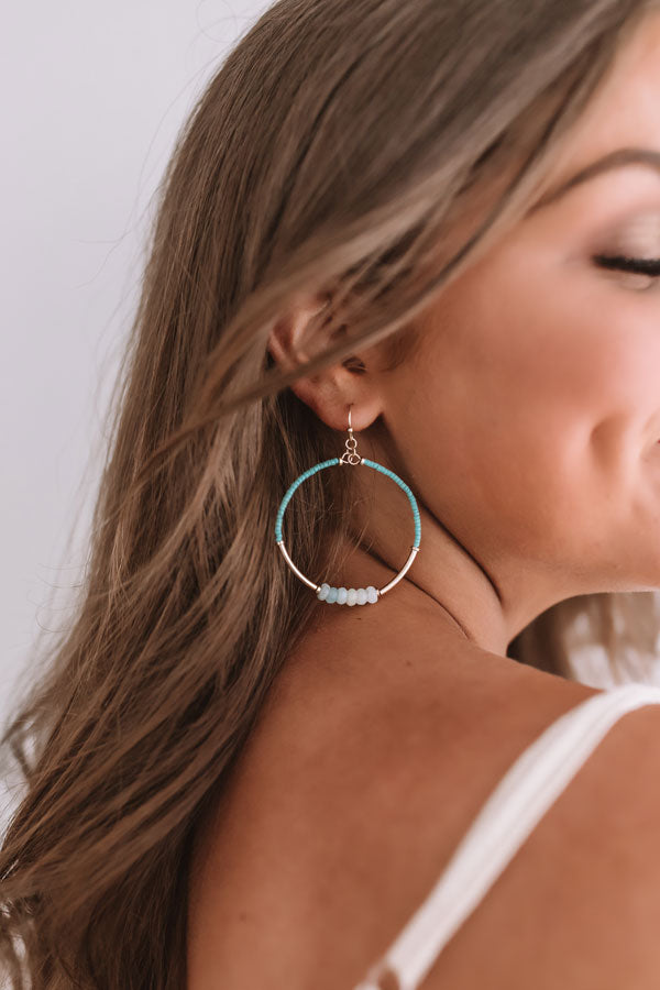 The Latest Scoop Earrings In Ocean Wave