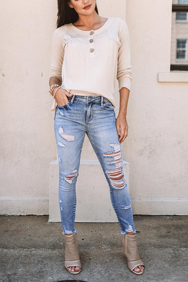 The Tess Midrise Distressed Ankle Skinny in Light Wash