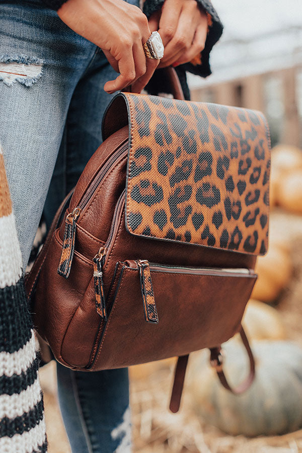 Leather best sale leopard backpack