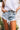 The Alexandra High Waist Destroyed Shorts in Light Wash