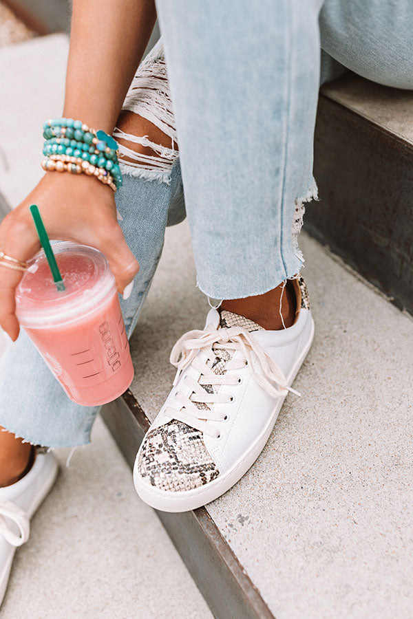 The Ellie Snake Print Sneaker In Ivory