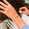 Kendra Scott Everlyne Blue Cord Friendship Bracelet in Turquoise Kyocera Opal Illusion Image - 1