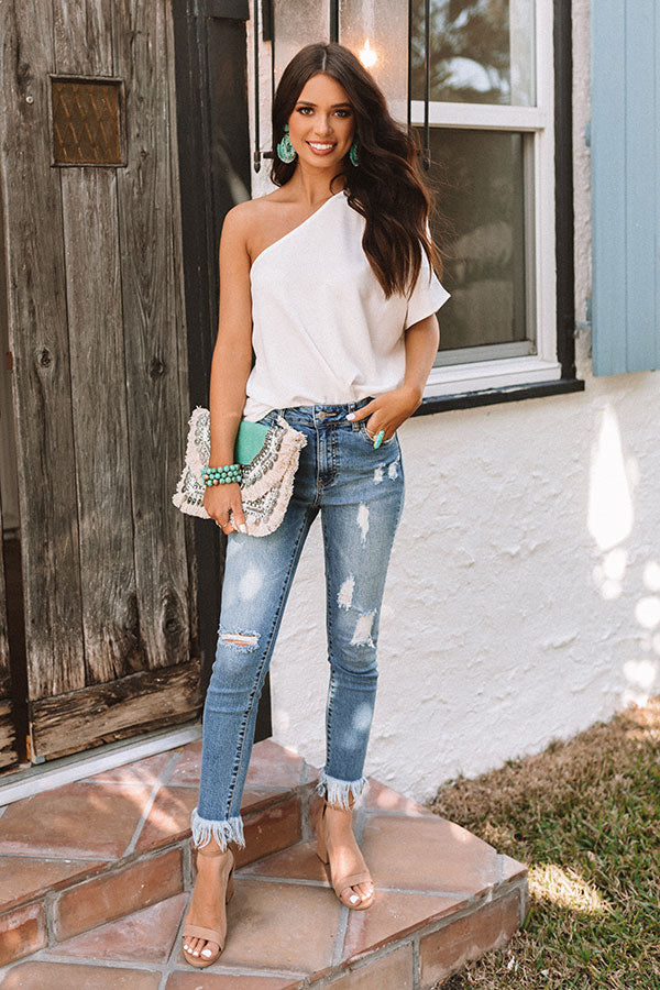 The Stiles Midrise Distressed Ankle Skinny