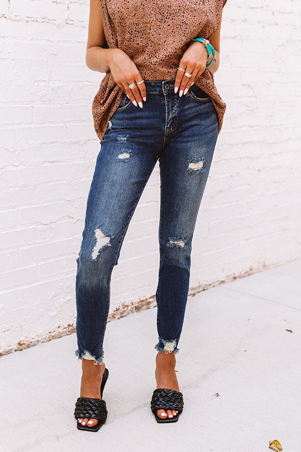 The Jenson Midrise Distressed Ankle Skinny