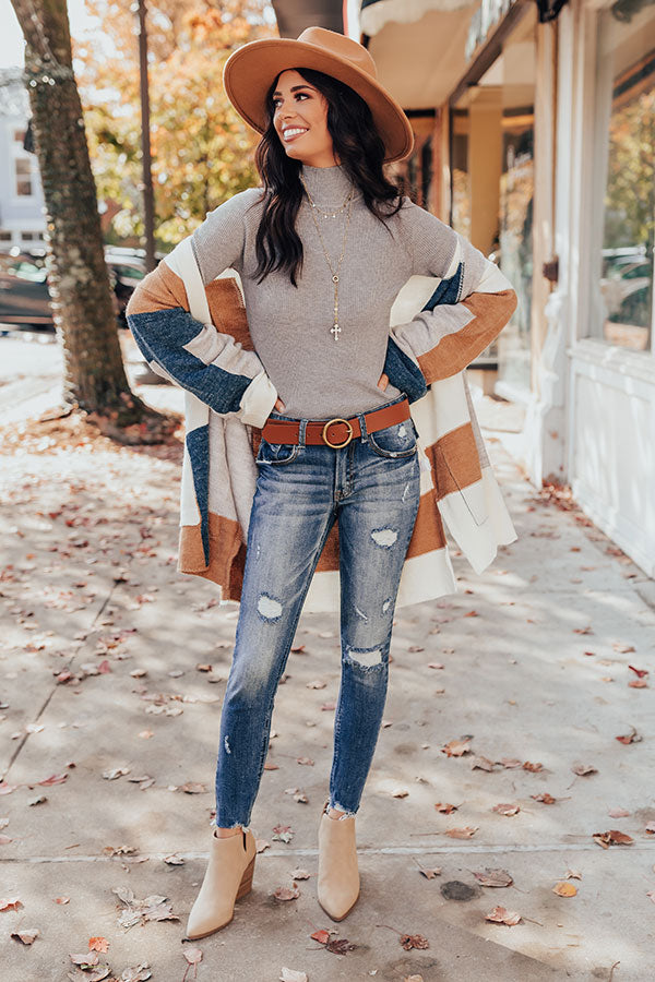 The Eden Midrise Distressed Ankle Skinny