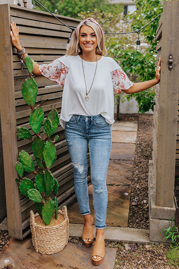 The Delphine High Waist Distressed Ankle Skinny