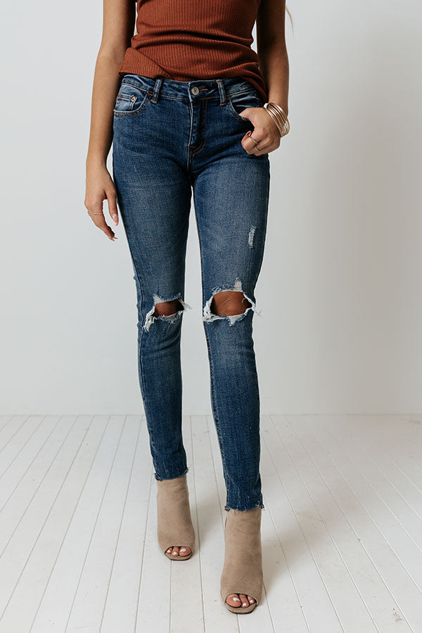 The Talia Midrise Distressed Ankle Skinny In Dark Wash