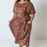 The Stassi Floral Midi In Orange Curves Image - 1