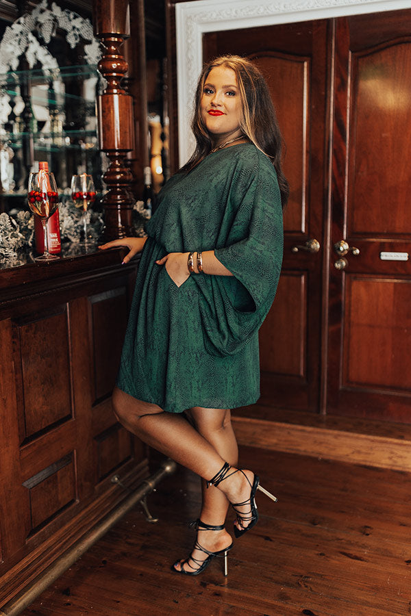 Spotlight Romance Snake Print Dress in Hunter Green Curves Impressions Online Boutique Spotlight Romance Snake Print Dress in Hunter Green Curves Impressions Online Boutique