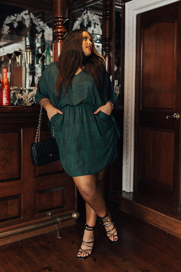 Spotlight Romance Snake Print Dress in Hunter Green Curves Spotlight Romance Snake Print Dress in Hunter Green Curves