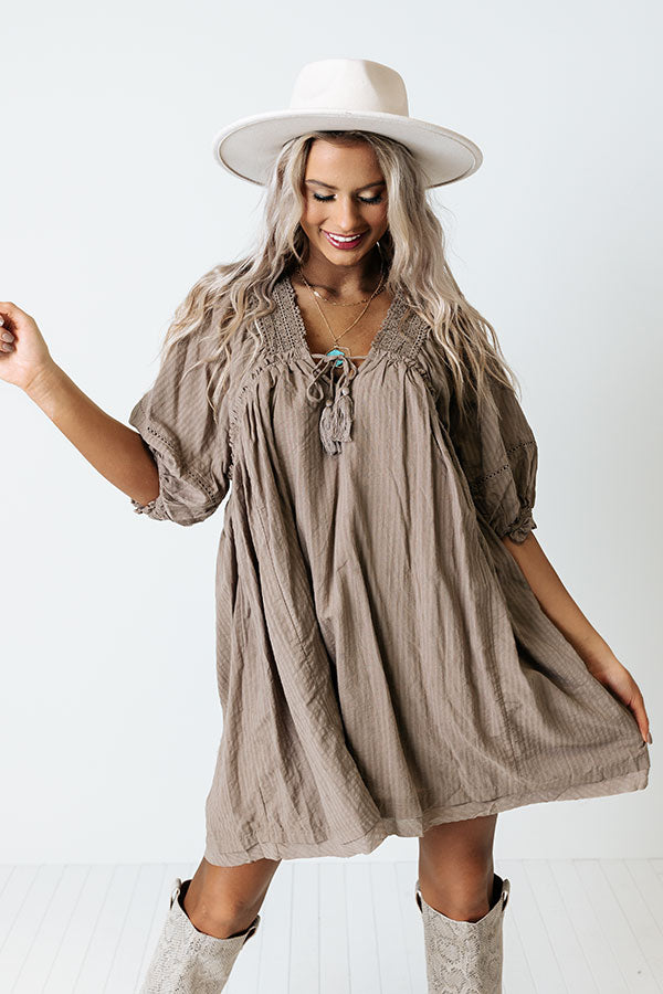 Writers Retreat Babydoll Dress In Taupe