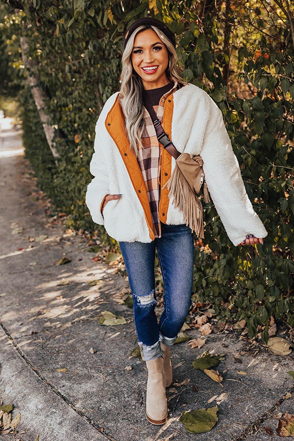 Embracing the cozy vibes of flannel season with one of our newest