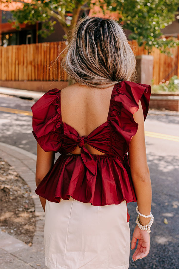 Stay Here Awhile Peplum Top In Maroon